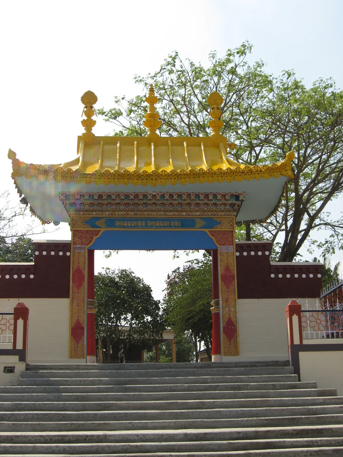 The gilded outer gate of Sera Monastery at Bylakuppe